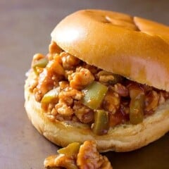 BBQ chicken sloppy joe sandwich on a grey board