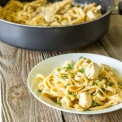 white bowl full of One Pot Cajun Chicken Alfredo