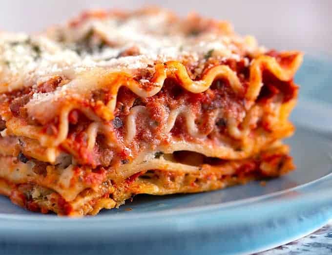 Best homemade lasagna sliced on a plate