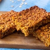 Best pumpkin baked oatmeal - 3 pieces on a cutting board