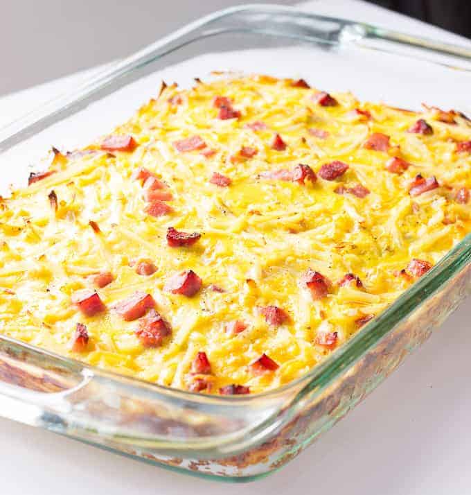 Baked Egg Casserole with ham and cheese in a baking dish