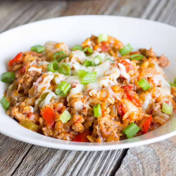 white bowl full of One Pot Wonder Stuffed Pepper Skillet