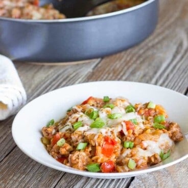 white bowl full of One Pot Stuffed Pepper Skillet