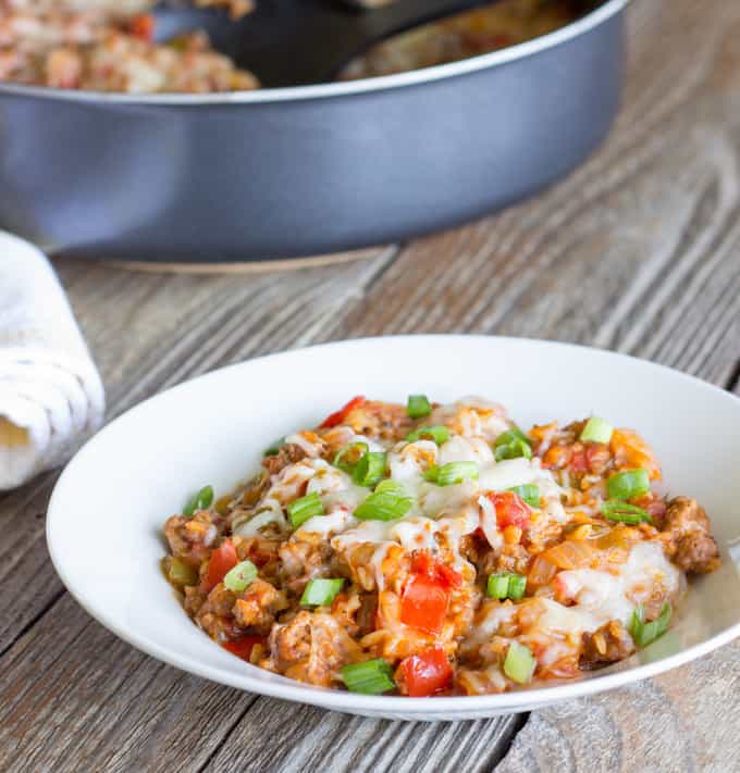 white bowl full of One Pot Wonder Stuffed Pepper Skillet