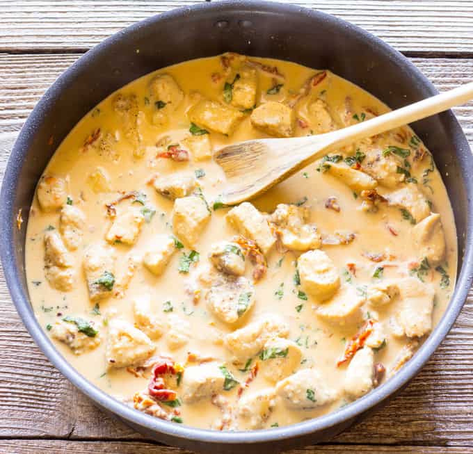 Chicken in Sun-Dried Tomato Basil Cream Sauce in a skillet