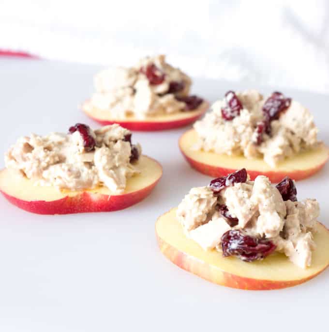 Cranberry Tuna Salad on Apple Slices on a white board