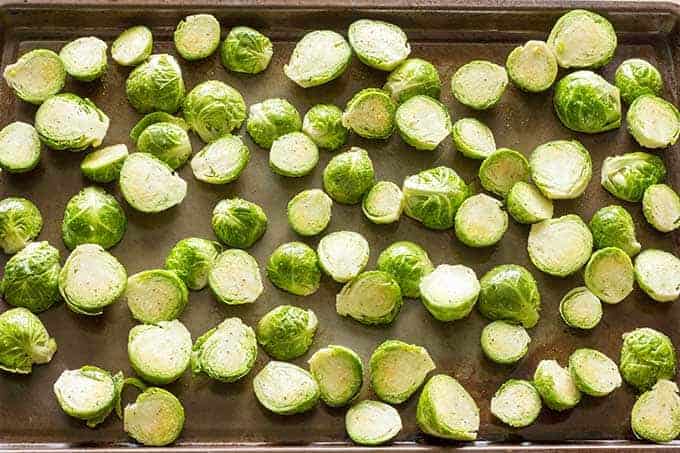 Baking sheet full of brussels sprouts for roasting