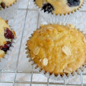 honey oat muffin on a cooling rack