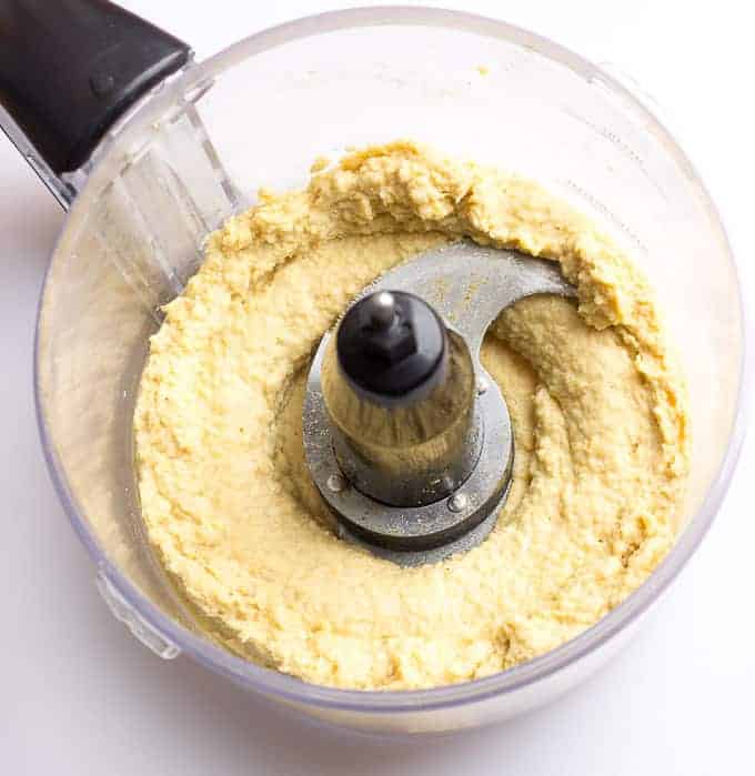 food processor full of Simple Hummus Without Tahini