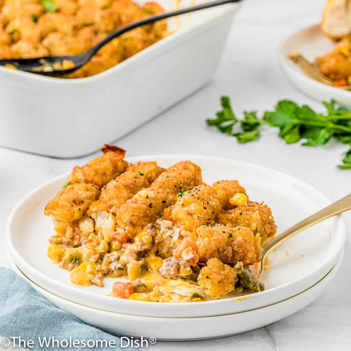 Plate full of tater tot hotdish.