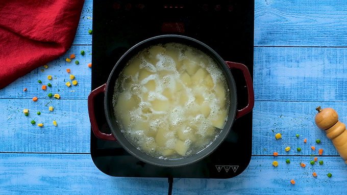 Pot of boiling potatoes for homemade Shepards Pie