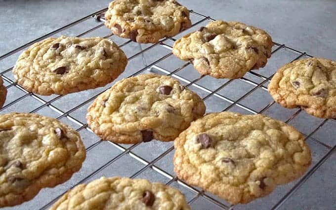 Batch of the best easy chocolate chip cookies recipe cooling on a rack