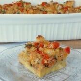 a piece of tomato parmesan breakfast casserole on a plate