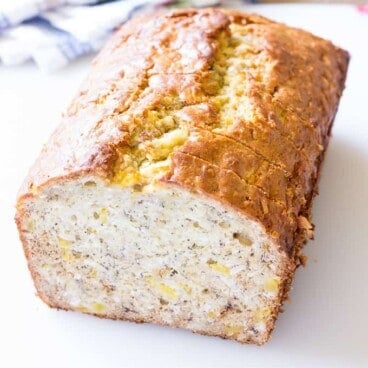 sliced Tropical Banana Bread on a cutting board